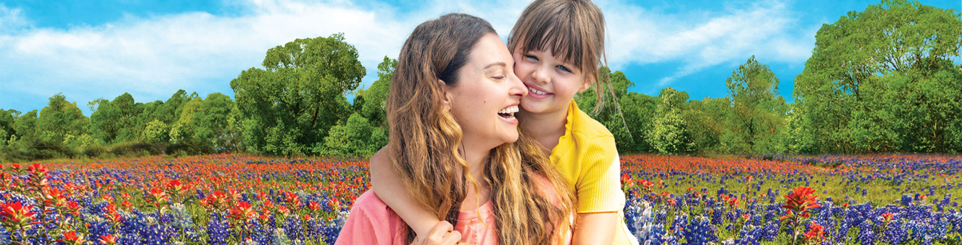 mother and daughter in a flower field